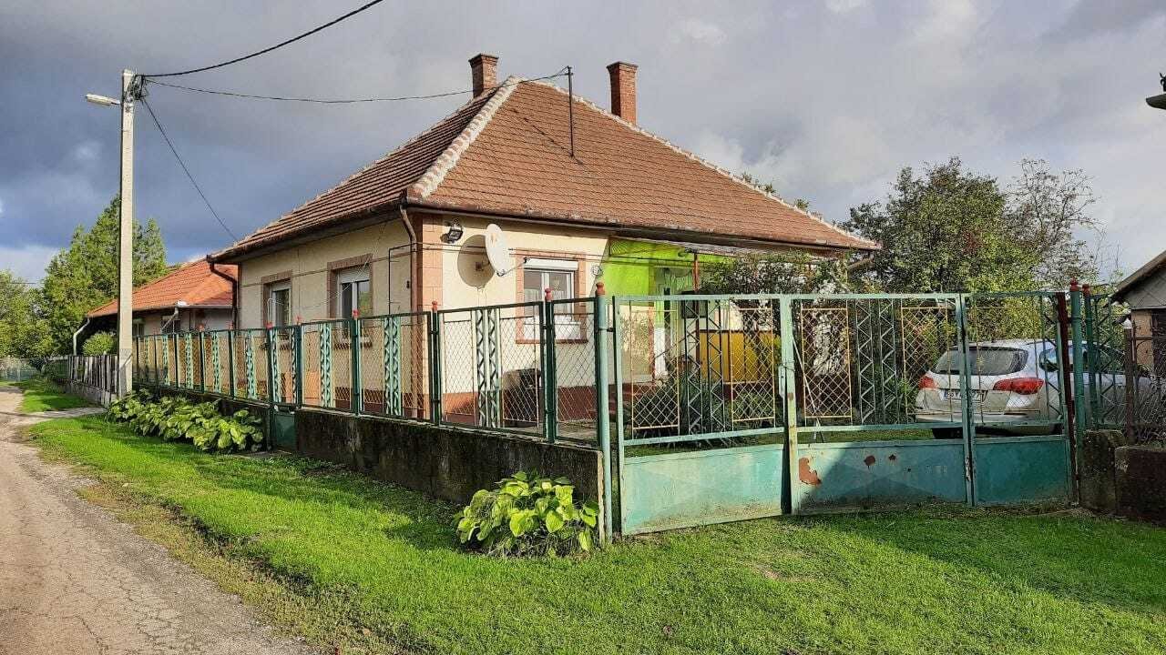 Charmantes Einfamilienhaus mit eingebautem Kaminofen und überdachter Veranda Charmantes Einfamilienhaus mit eingebautem Kaminofen und überdachter Veranda